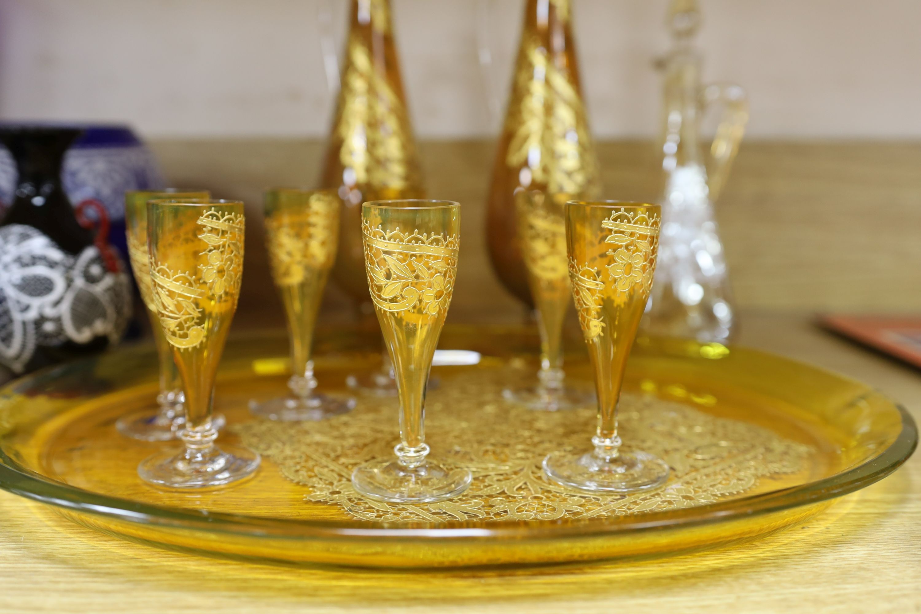 Selection of Venetian lace-pattern coloured glassware including an amber liqueur set